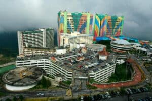 Aerial view of the colorful First World Hotel, a landmark in Malaysia's Genting Highlands.